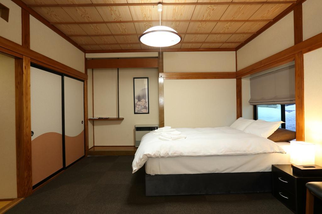 Snowlines Lodge Hakuba Zimmer foto