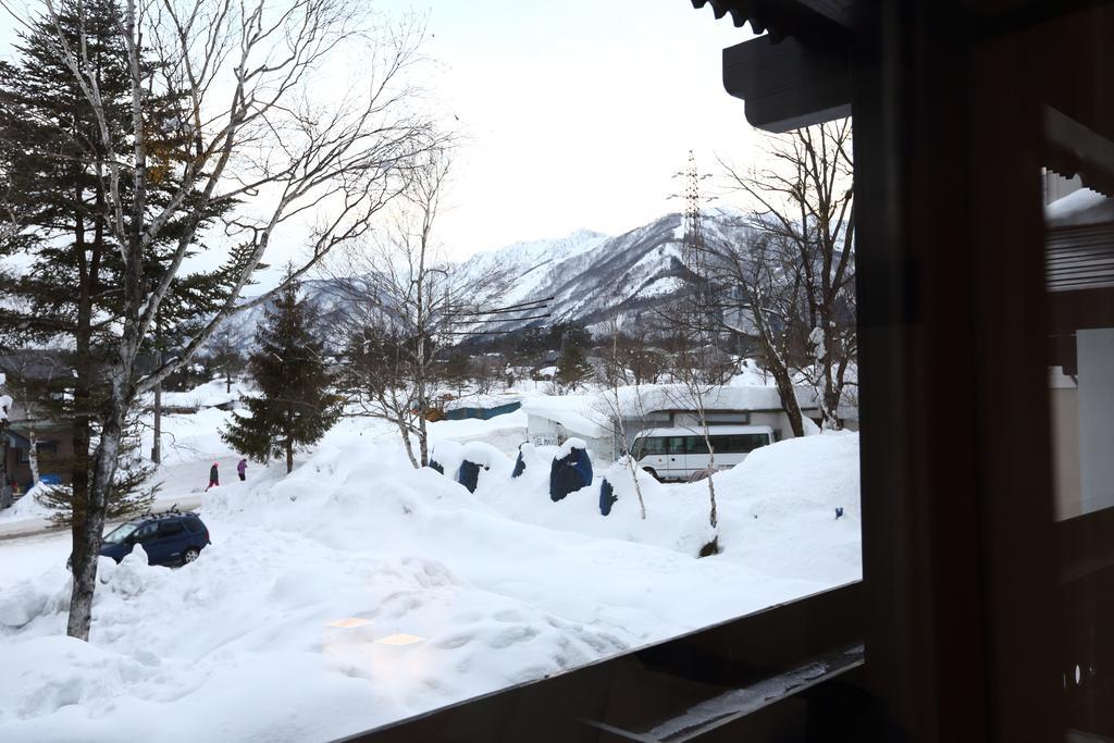 Snowlines Lodge Hakuba Zimmer foto