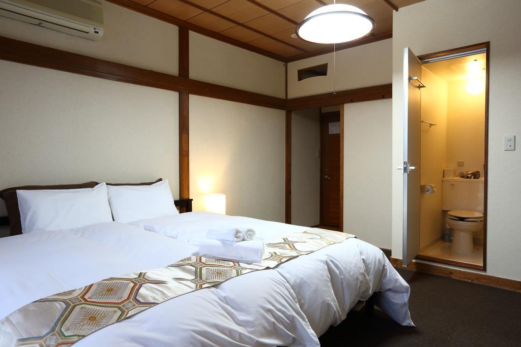 Snowlines Lodge Hakuba Zimmer foto