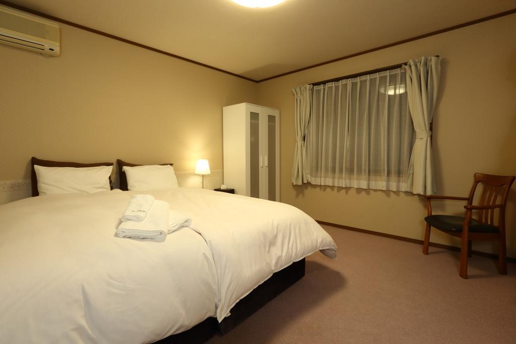 Snowlines Lodge Hakuba Zimmer foto