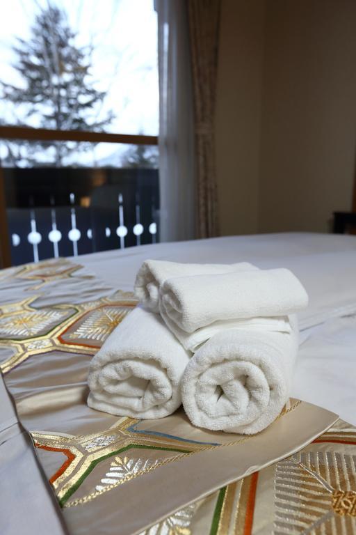 Snowlines Lodge Hakuba Zimmer foto
