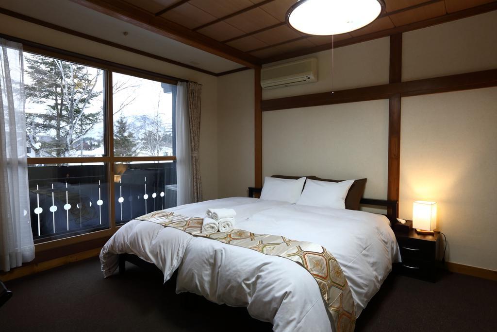 Snowlines Lodge Hakuba Zimmer foto